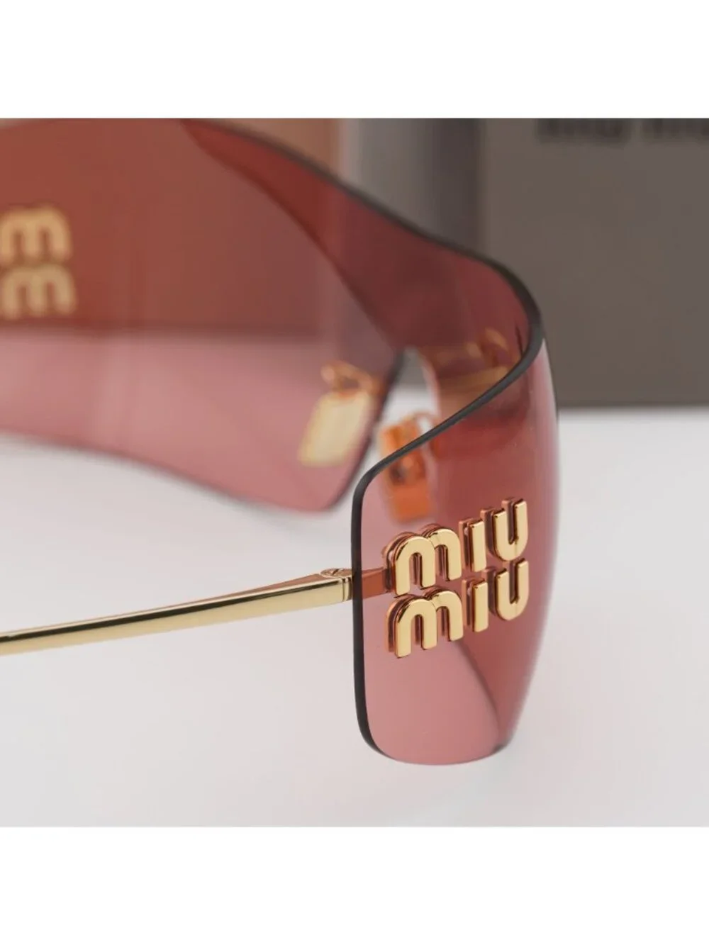 Miu Miu MUB53S 5AK20Y Rimless Shield Sunglasses – Gold / Red